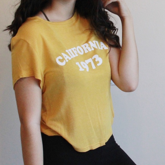 Divided Tops - Yellow graphic tee